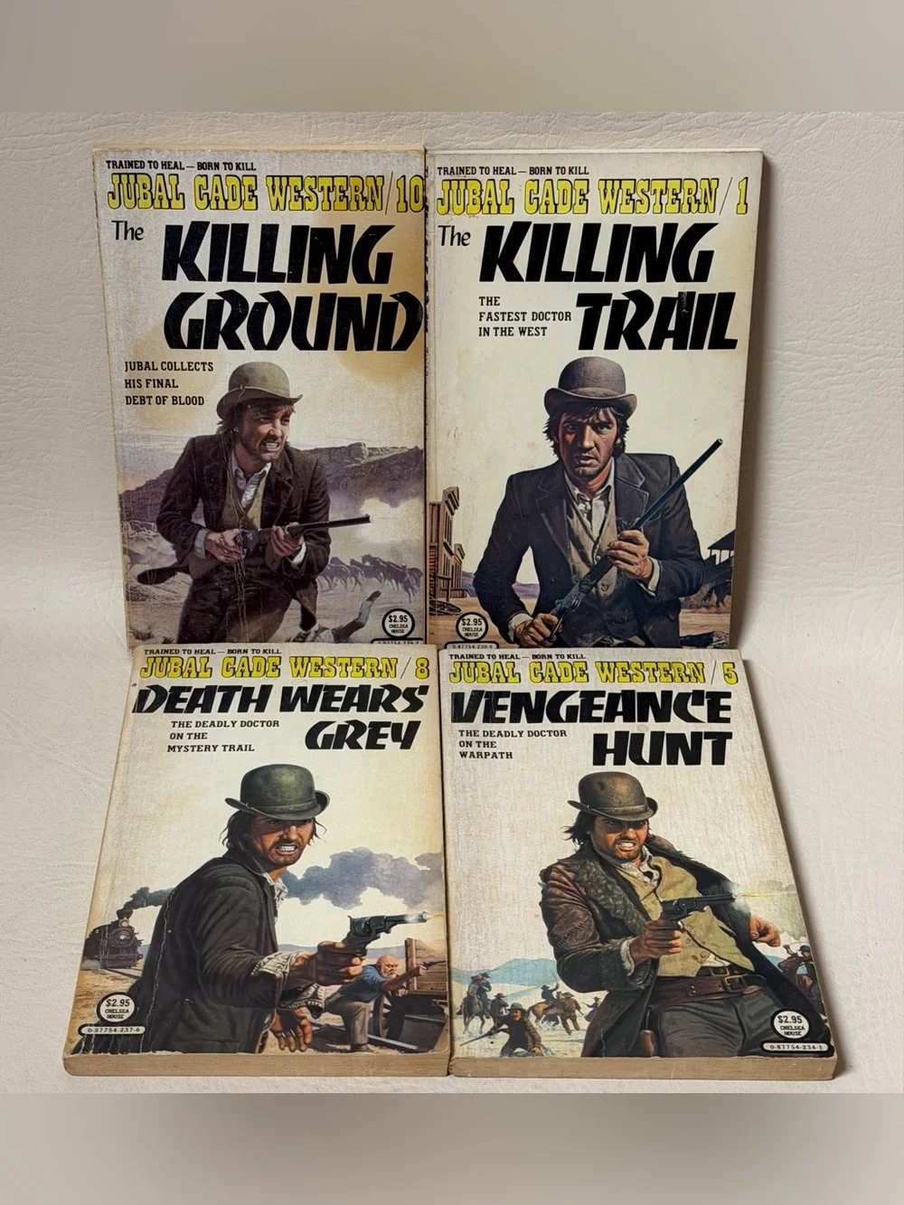 Vintage set of (4 ) JUBAL CADE WESTERNS Paperback Books